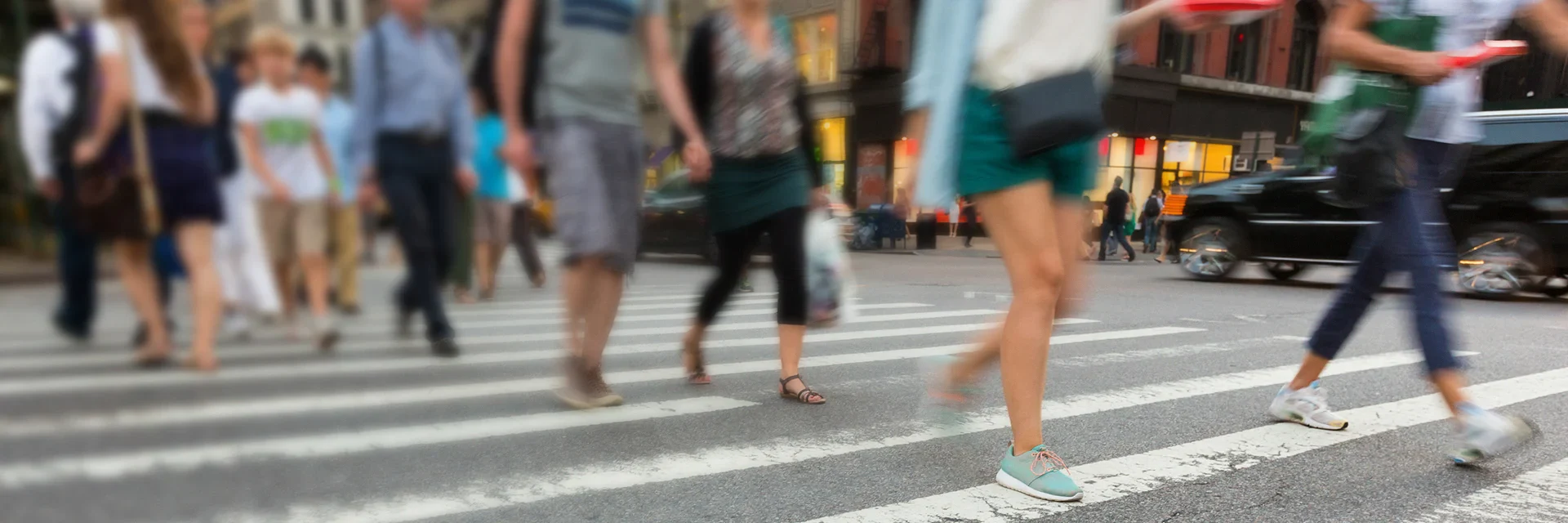 Pedestrians crossing a street in New York City